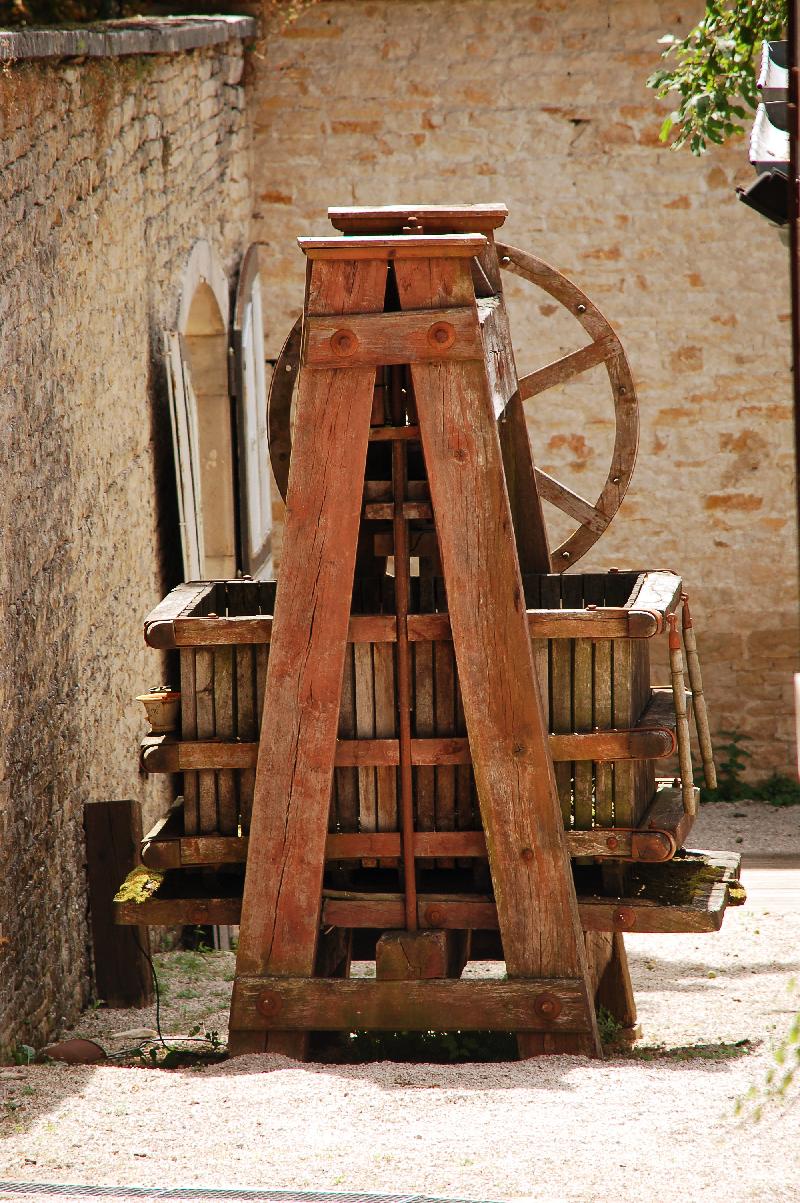 Antique wine press,Old wine press,Wine making,Winery,Vineyard,Burgundy,France,Countryside,Agriculture