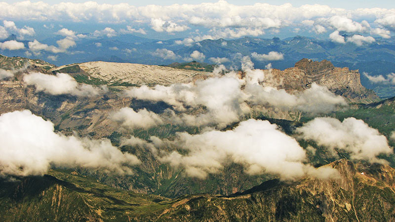 Chamonix Mont Blanc,clouds above the mountains,mountain range,mountain peaks